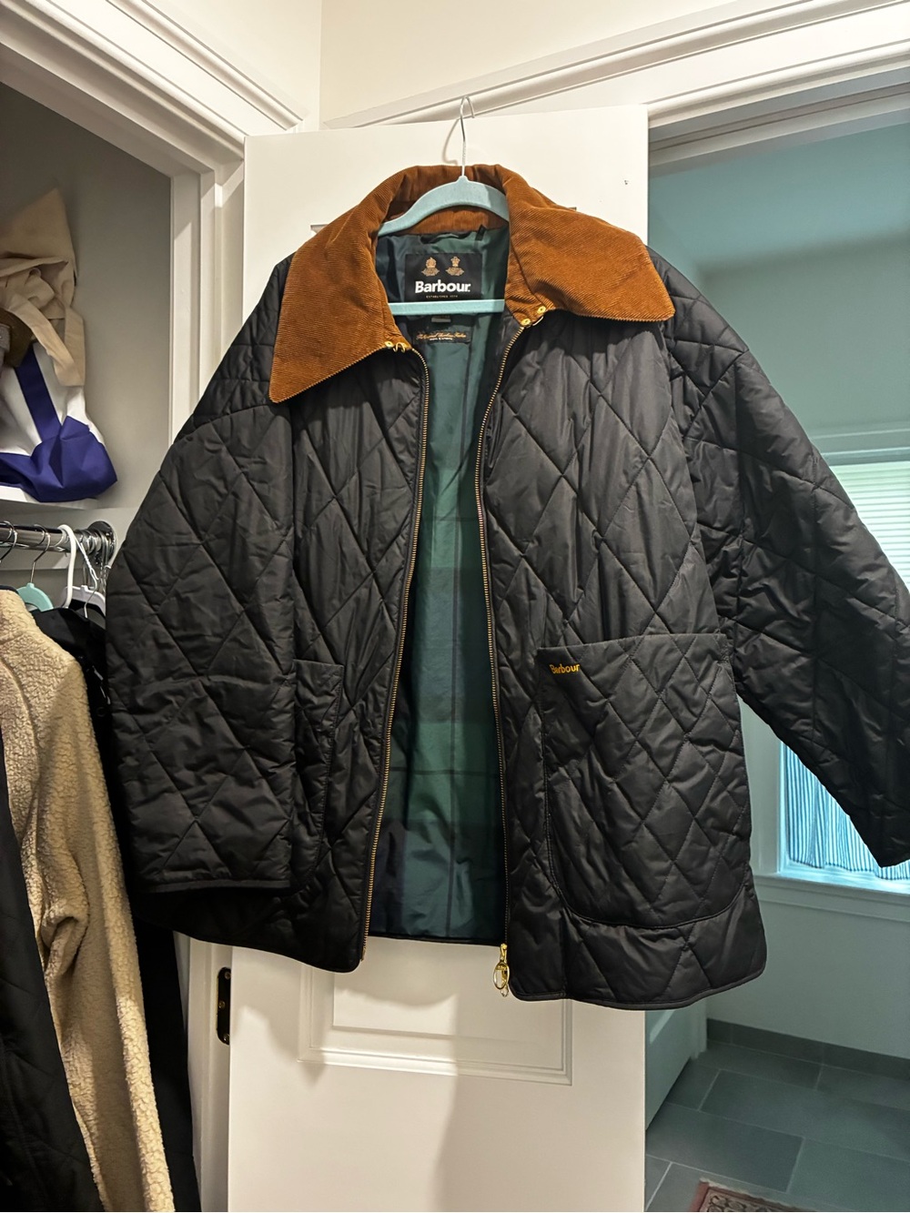 Barbour women’s Black Quilted Jacket with Brown Cord Collar